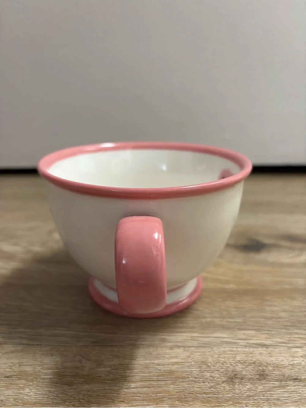 Starbucks Cream Ceramic Teacup with Pink Trim and Floral Motif